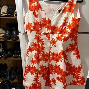 Sleeveless White Tank Top with Orange Floral Print